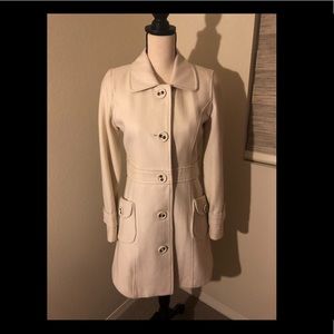 Cream color trench coat. Size M